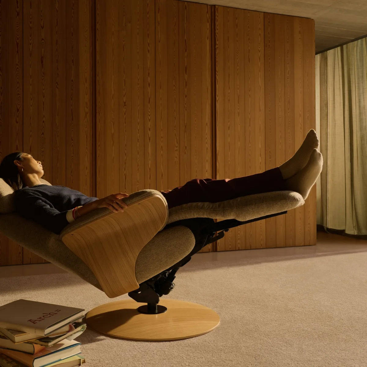 Stressless Adam with Disc base in the Zero Gravity position; the user's legs are higher than their heart