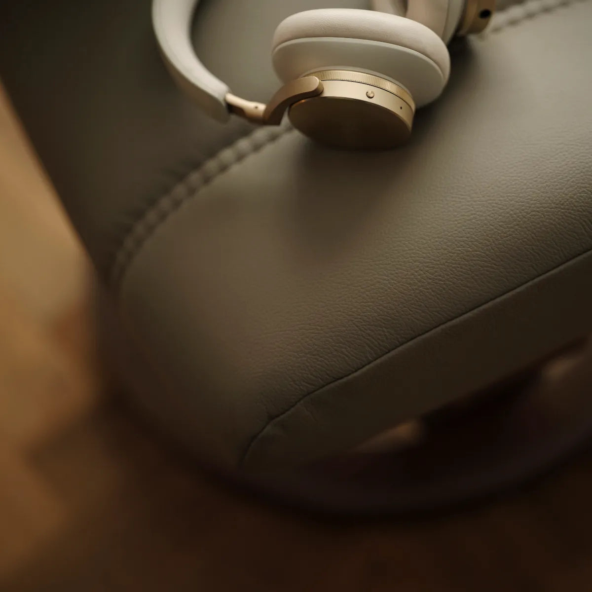 Close-up of the armrest and seat of a Stressless Consul in Batick Mole leather